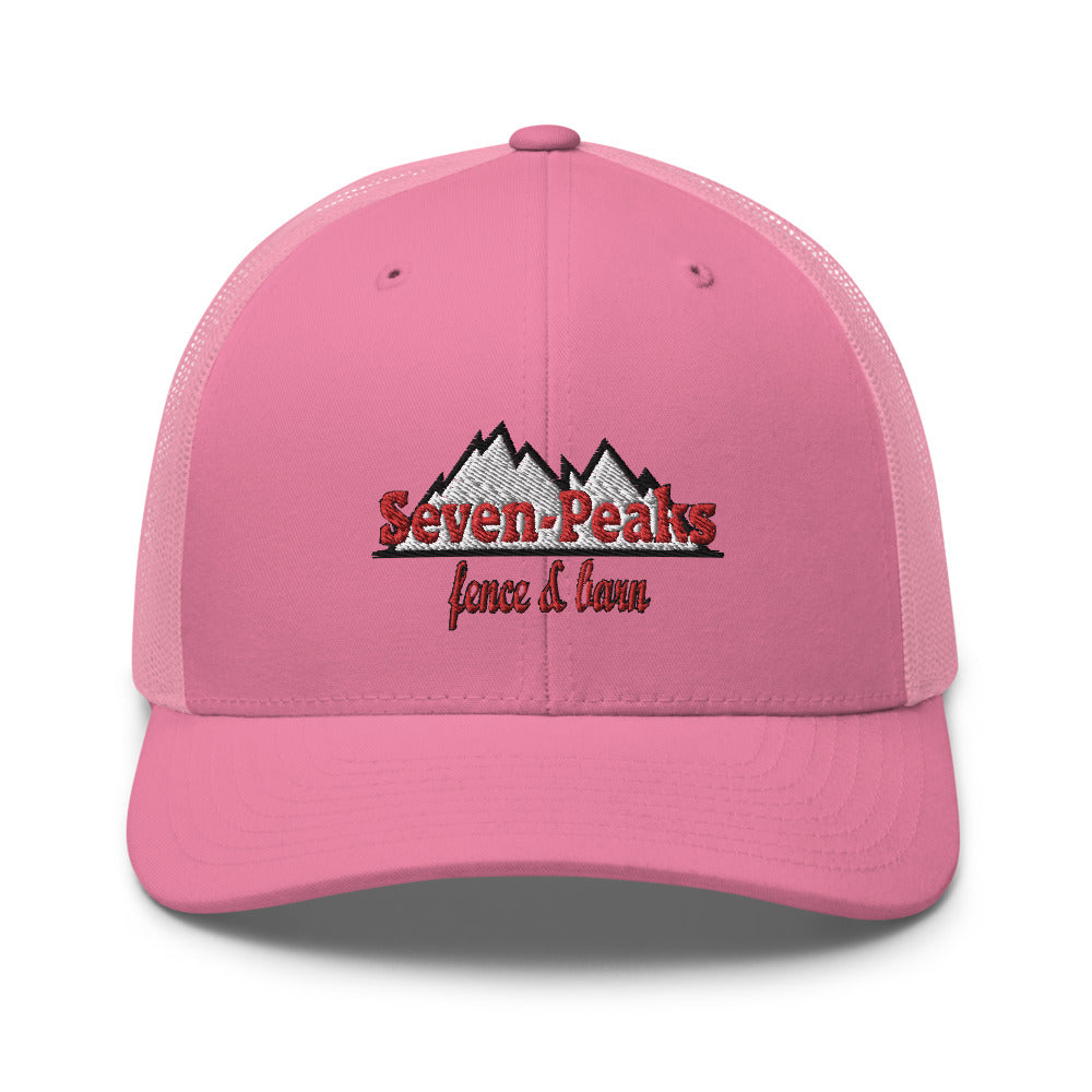 pink trucker cap with seven peaks fence and lawn logo
