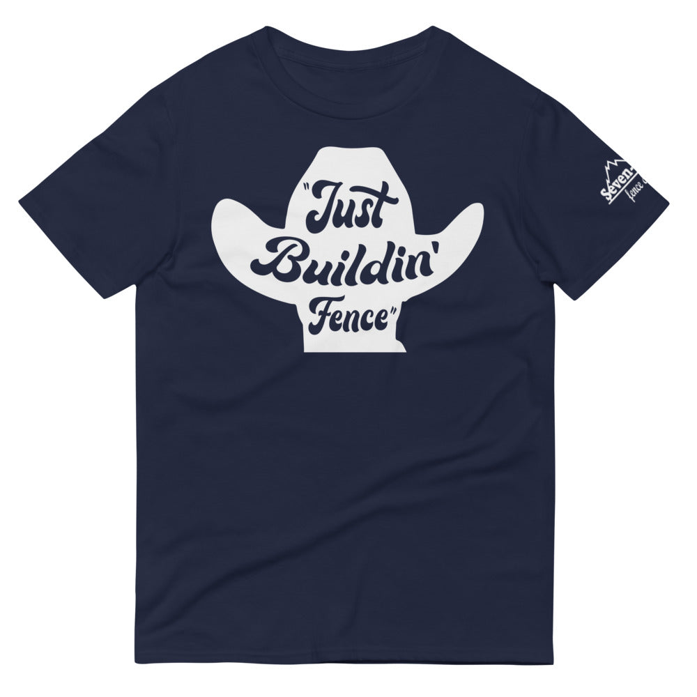 navy blue t-shirt with "Just Buildin' Fence" cowboy hat design