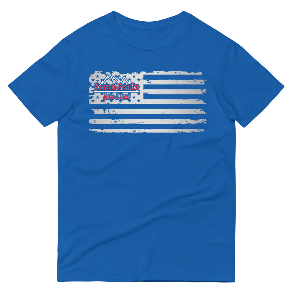 Blue t-shirt with vintage American flag design and Seven Peaks logo.