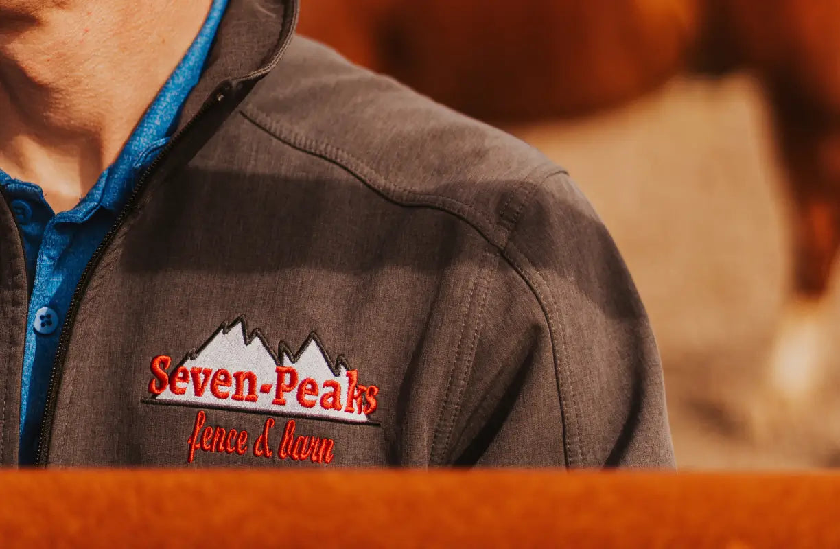 Seven Peaks jacket logo close-up.