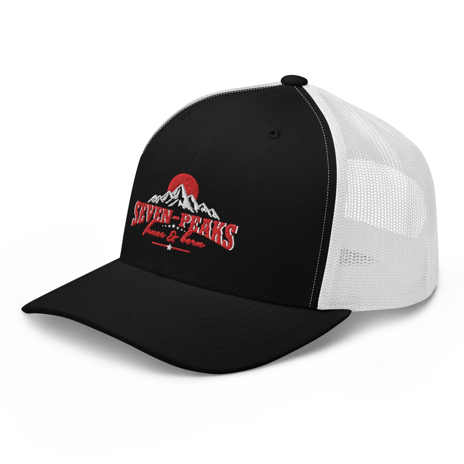Seven Peaks Fence and Barn's snap back hat with an outline of a mountain with 7 peaks and a red sun behind the mountains with the text Seven-Peaks fence & barn.