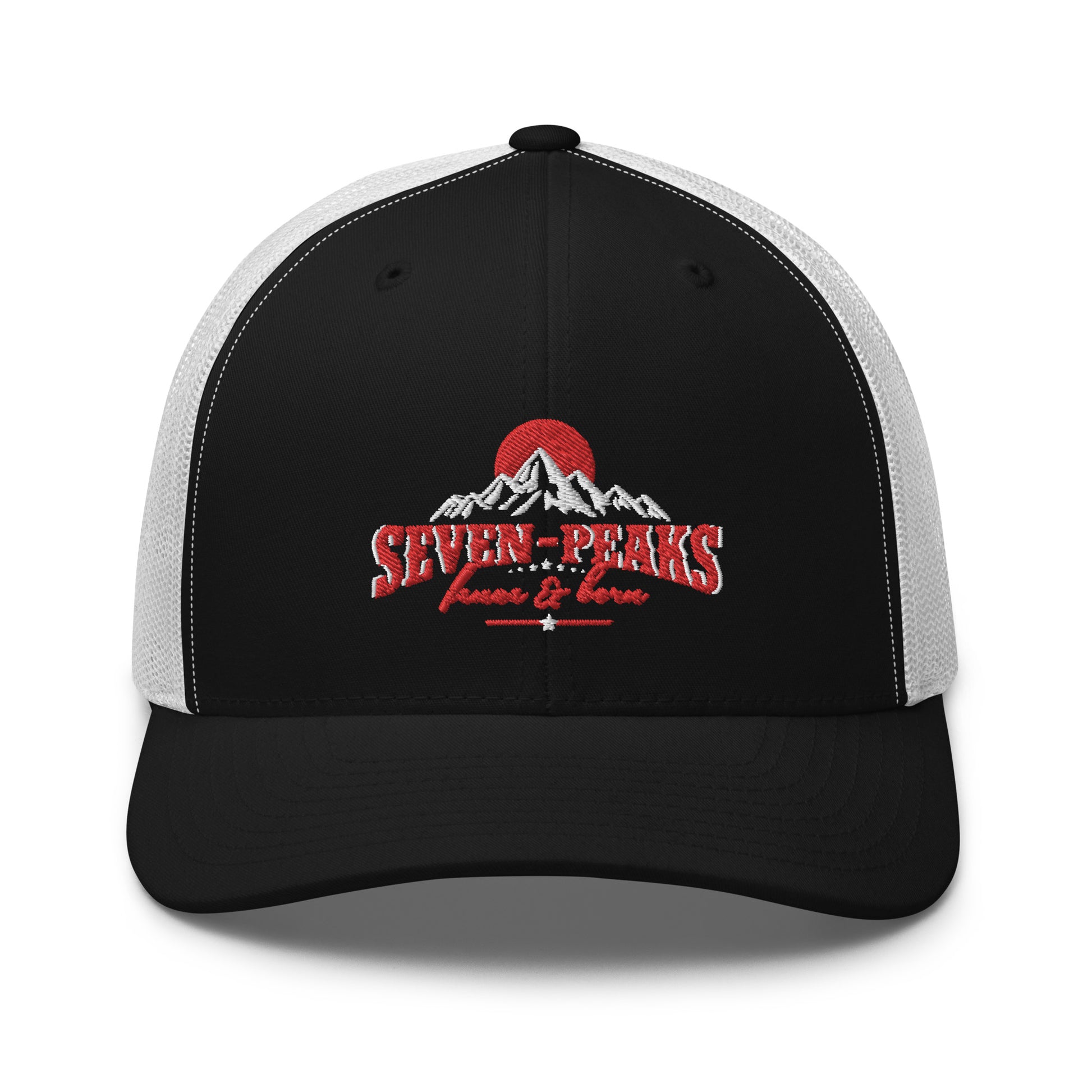 black and white trucker hat with Seven Peaks mountain logo
