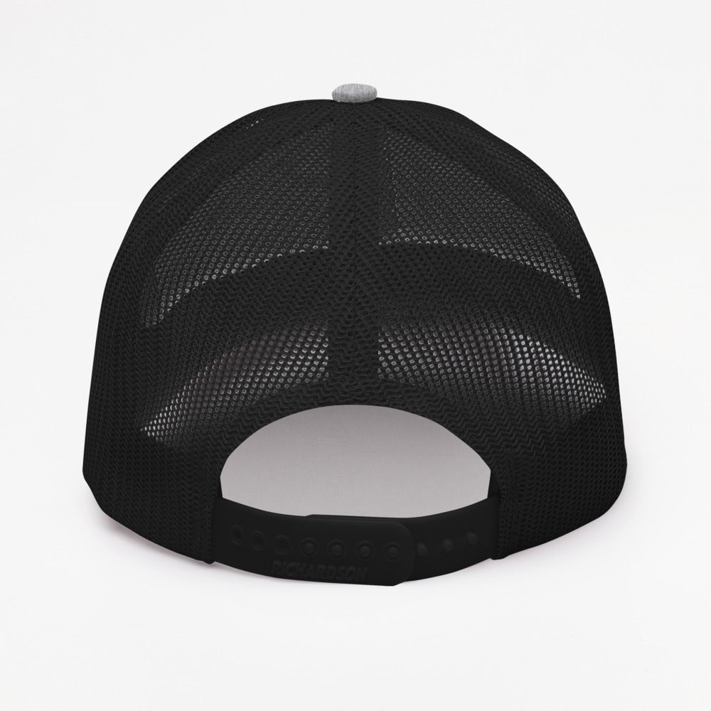 black mesh trucker hat back view