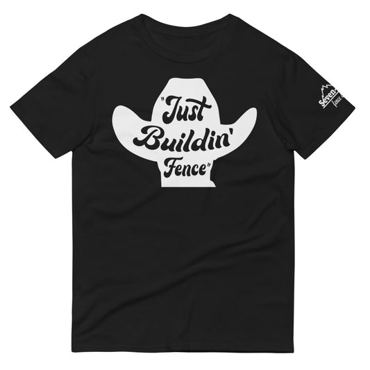 black t-shirt cowboy hat design "Just Buildin' Fence" text