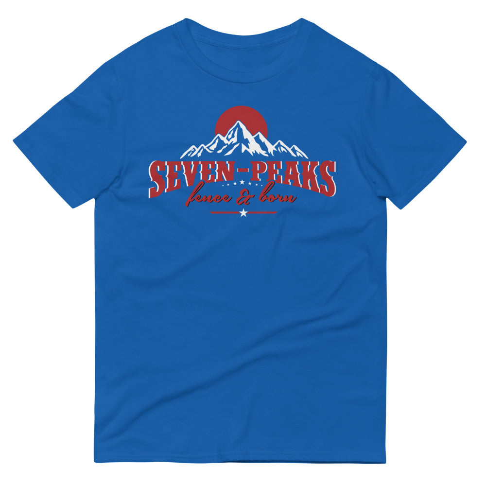 Blue t-shirt with mountain and sun graphic "Seven Peaks fierce & born"